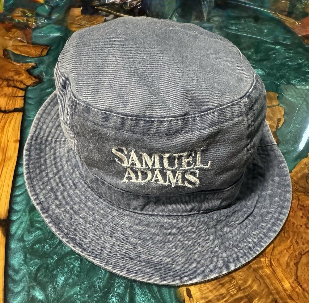 Samuel Adams in White Letters on Washed out Blue Bucket Hat Vented L/XL
